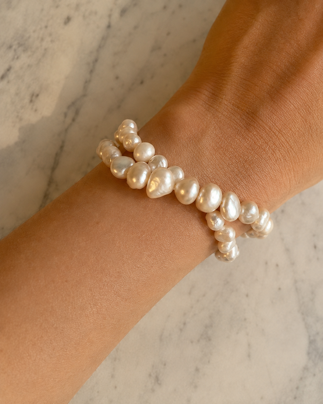 MONLANA Cannes Double Pearl Bracelet worn on a woman's wrist